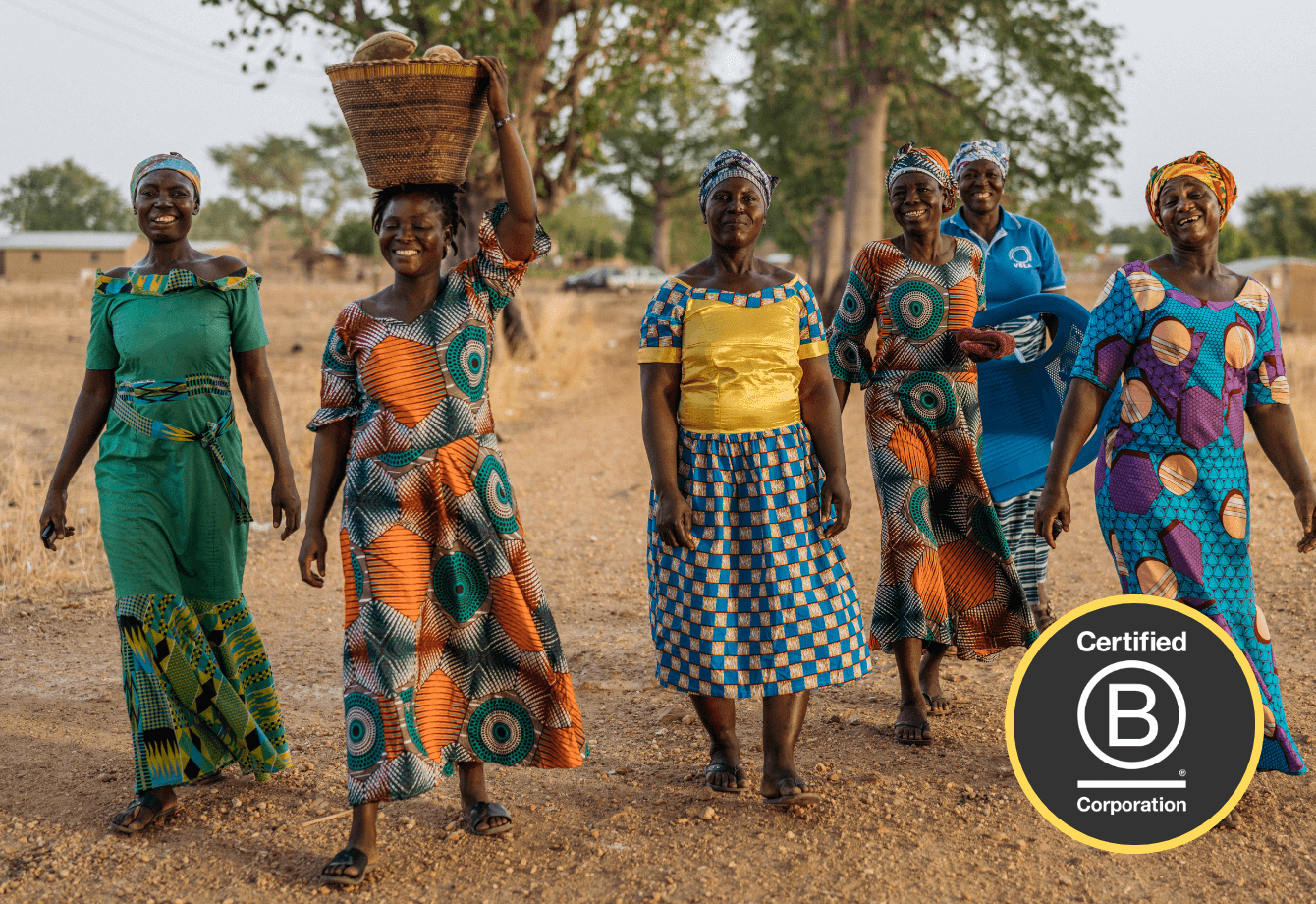 Photo of six superfood producers walking outside along a track, and a Certified B Corporation logo overlay in the corner.