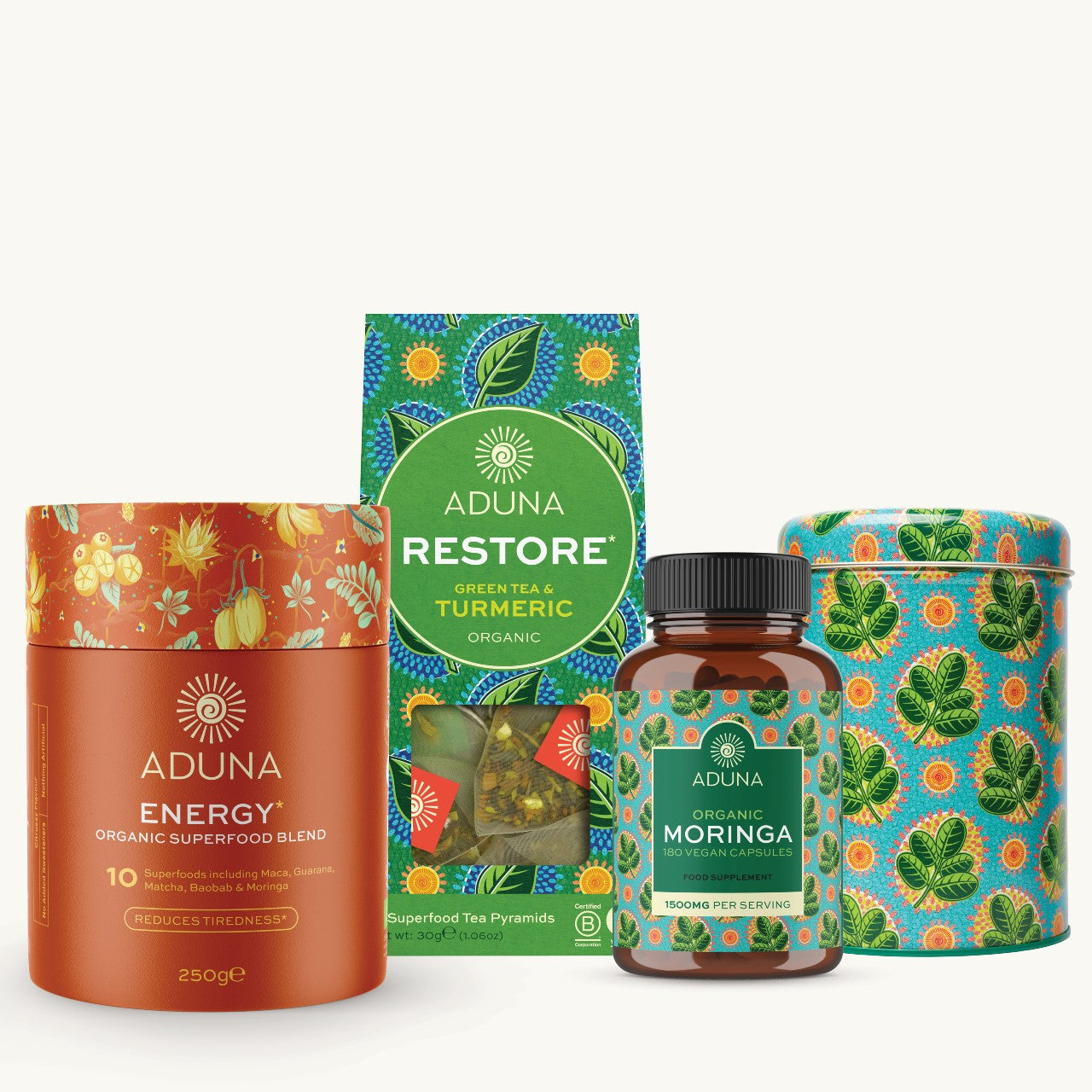 Collection of Aduna superfoods including Energy blend, Restore tea, Moringa capsules, tin