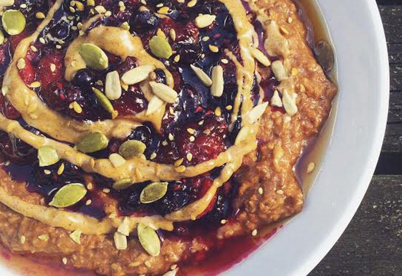 Cacao, Coconut & Baobab Porridge with Sour Cherry Syrup